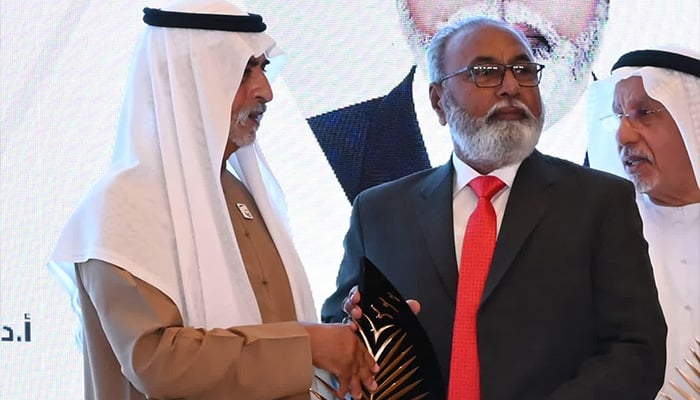 Pakistani researcher Dr Ghulam Sarwar Markhand (right) receives the prestigious award from UAEs Minister of Tolerance and Coexistence, Sheikh Nahayan Mabarak Al Nahyan. — Pakistan Consulate Dubai