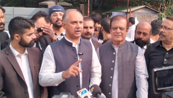 Leader of Opposition in National Assembly Omar Ayub (centre left) and Leader of Opposition in Senate Shibli Faraz (centre) right addressing media in Rawalpindi on November 8, 2024. —Facebook/@OmarAyubKhan.Official