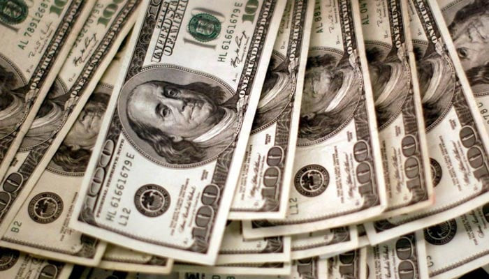 An undated image of freshly printed dollar bills in a mint. — Reuters