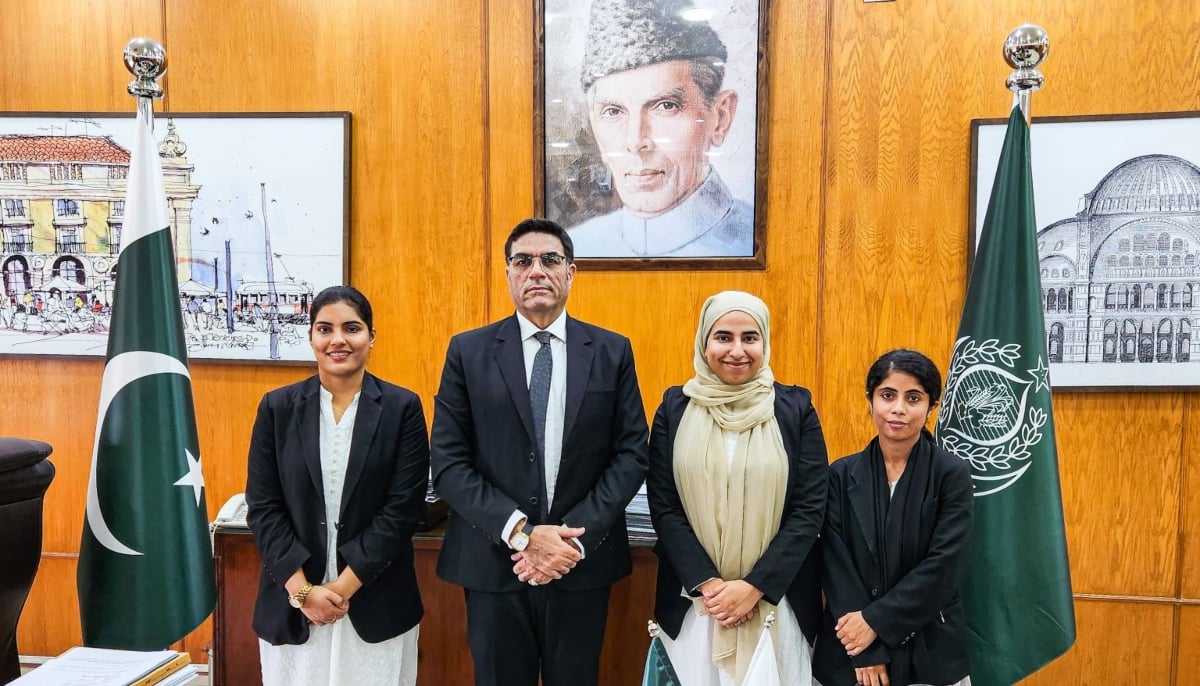 Laywer Khushbakht Shah Jillani (second from right) poses with fellow lawyers. — LinkedIn/@khushbakhtshahjillani
