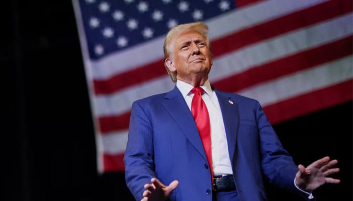 Republican presidential nominee and former U.S. President Donald Trump gestures during a rally in Novi, Michigan, U.S. October 26, 2024. — Rueters