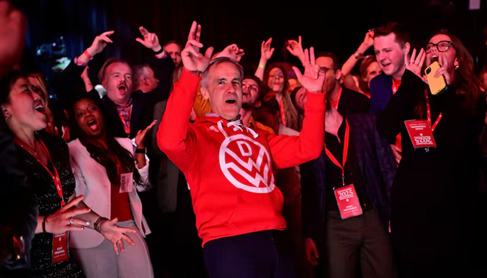 Canadas Prime Minister Mark Carney dances during an event at the Liberal Party election night headquarters in Ottawa, Ontario, Canada April 29, 2025. — Reuters