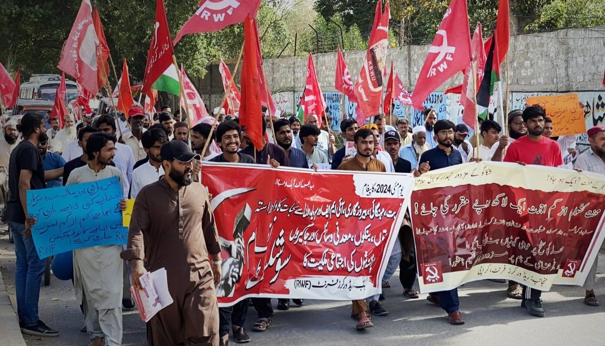 Members of the Red Workers Front participate in a rally. — Red Workers Front