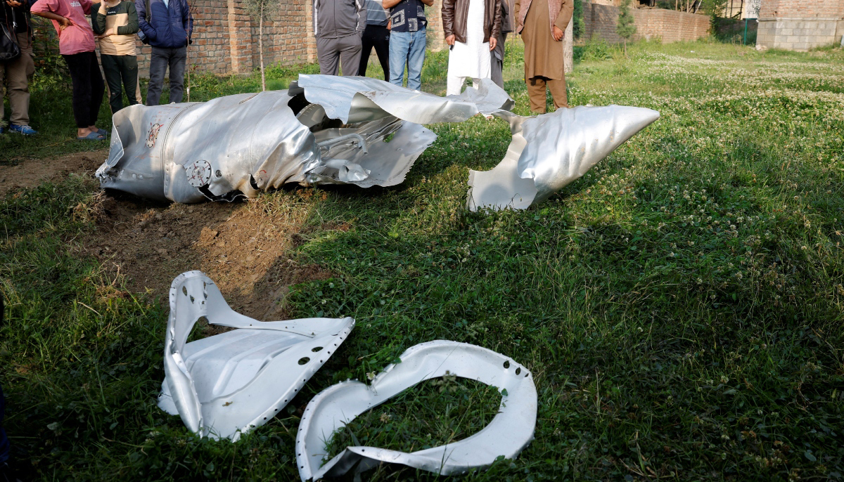 Metal debris lies on the ground in Wuyan in IIOJKs Pulwama district May 7, 2025.  — Reuters