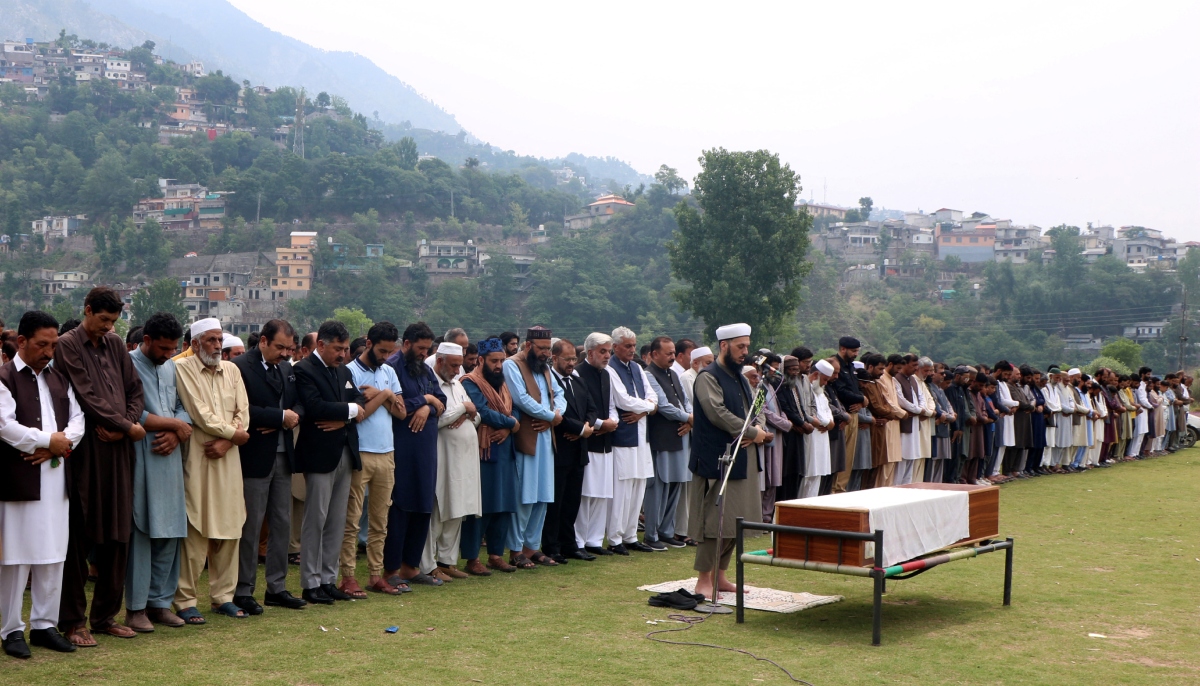 People offer funeral prayers for a man who was martyred in an Indian strike in Muzaffarabad, Azad Jammu and Kashmir, on May 7, 2025. —Reuters