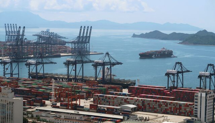 A cargo ship carrying containers is seen near the Yantian port in Shenzhen, following the novel coronavirus disease (COVID-19) outbreak, Guangdong province, China May 17, 2020. — Reuters