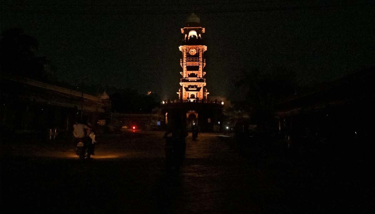 The clock tower at the Sardar Market is pictured during a blackout in Jodhpur on May 9, 2025. — AFP
