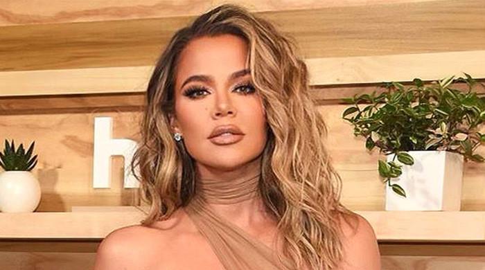 Khloé Kardashian turns heads with her style at perfume launch in Germany