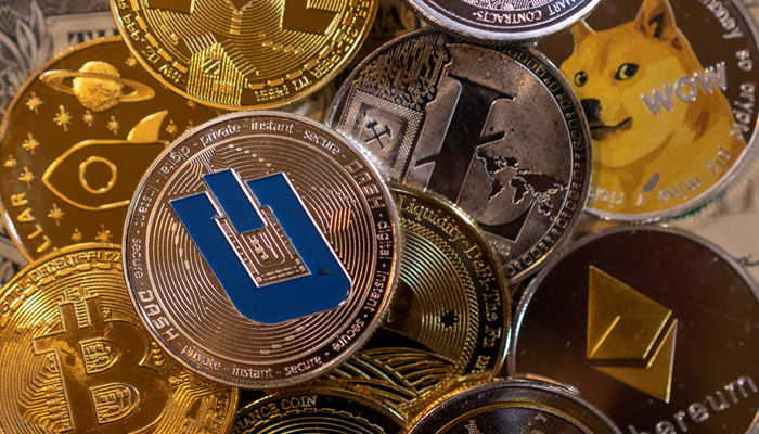 Representations of virtual cryptocurrencies are seen in this illustration taken November 28, 2021. — Reuters