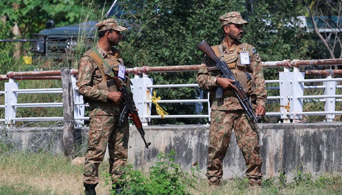 Pakistani soldiers stand guard at the Red Zone area, ahead of the arrival of Chinese Premier Li Qiang for a four-day bilateral visit and a heads-of-government gathering of the Shanghai Cooperation Organisation (SCO), in Islamabad on October 14, 2024. — Reuters