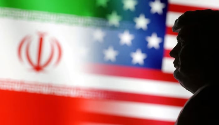 A 3D-printed miniature model of Donald Trump and the US and Iran flags are seen in this illustration taken January 15, 2025. — Reuters