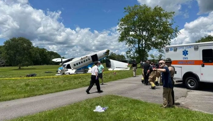 The image shows a plane lying in wreckage in Tennessee. — X@@IntelPointAlert/File