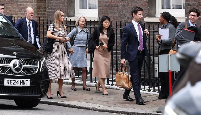 Officials arrive at the entrance to Lancaster House for trade talks between US and China, in London, Britain, June 9, 2025. —Reuters