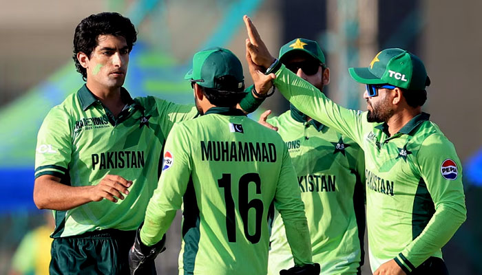 Pakistans Naseem Shah celebrates with teammates after taking the wicket. — Reuters/File