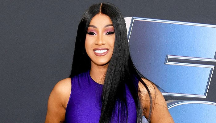 Cardi Bs daughter Blossoms face revealed for first time in family snaps