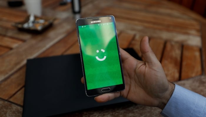 Image shows the logo of ride-hailing company Careem on a mobile phone. — Reuters