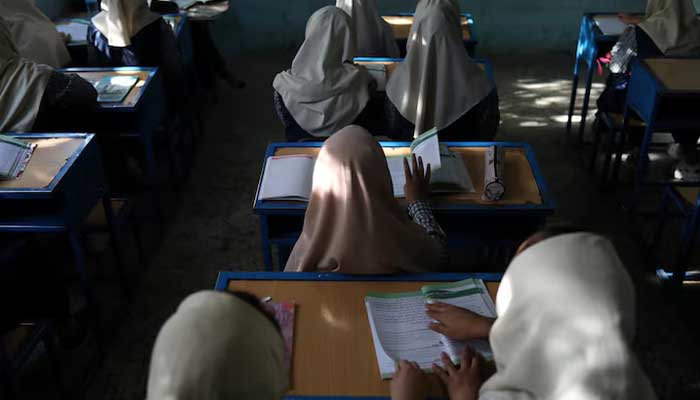 Afghan girls sit in a classroom at a school in Kabul, Afghanistan, September 18, 2021. — Reuters