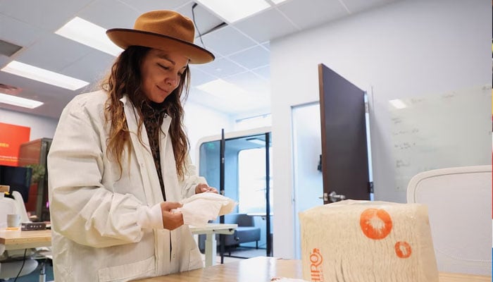 Hiro Technologies co-founder Miki Agrawal examines a diaper equipped with a pouch full of plastic-eating fungi at her company’s laboratory, in Austin, Texas, U.S, May 15, 2025. — Reuters