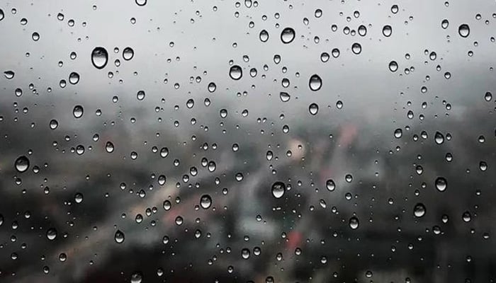 Raindrops on a glass window seen in this representational image. — Unsplash