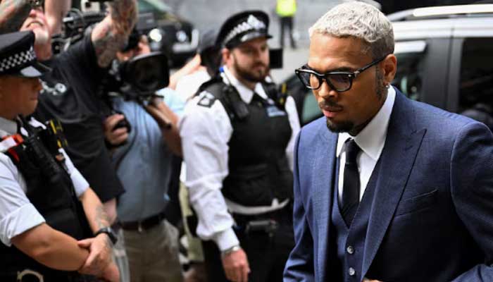 Why was Chris Brown put in UK jail?