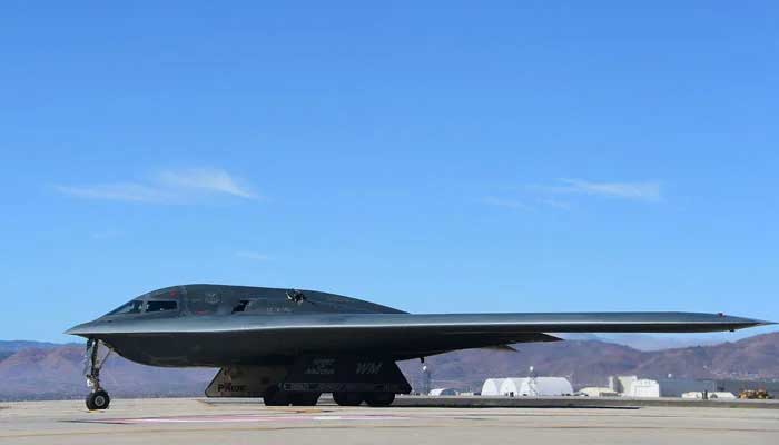 A B-2 Stealth Bomber, which is the only military aircraft capable of deploying the GBU-57, pulls up on the runway after landing at the Palmdale Aircraft Integration Center of Excellence in Palmdale, California on July 17, 2014. — AFP