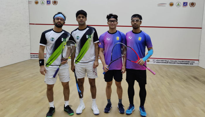 (From left) Pakistans Nasir Iqbal and Noor Zaman pose with Malaysian opponents, Duncan Lee and Syafiq Kamal in this undated image. — Reporter