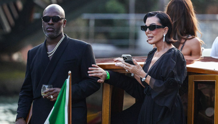 Corey Gamble and Kris Jenner stand on a boat, ahead of the anticipated wedding of Amazon founder Jeff Bezos and Lauren Sanchez in Venice, Italy, June 26, 2025. — Reuters