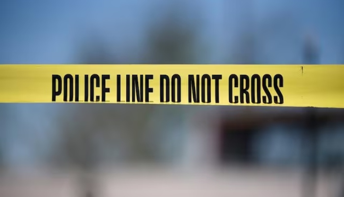 Police tape outlines a perimeter. — Reuters/File