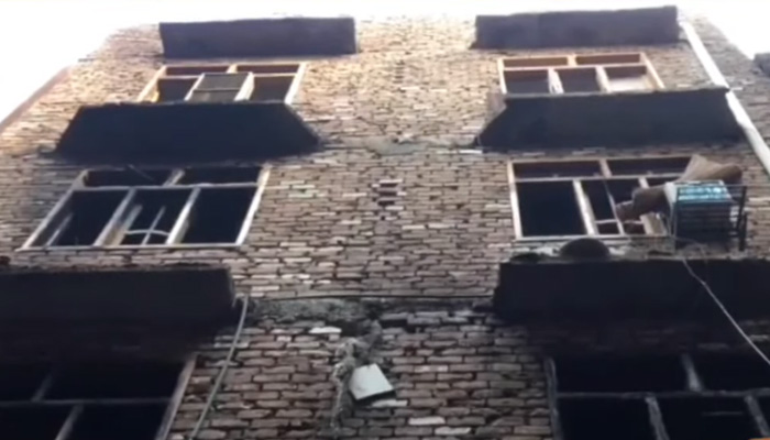 A view of the house that caught fire in Peshawars Kochi Bazaar taken from a video on July 8, 2025. — Reporter