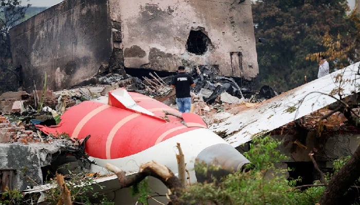 A fire officer stands next to the crashed Air India Boeing 787-8 Dreamliner aircraft, in Ahmedabad, India, June 13, 2025. — Reuters
