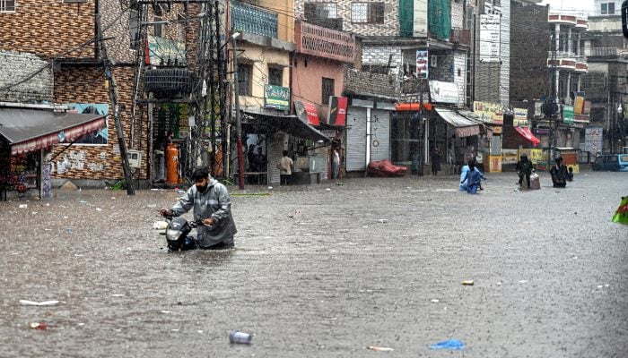 Dhok Khabba Road submerged in water due to heavy rain experienced in Rawalpindi, July 17, 2025. — APP