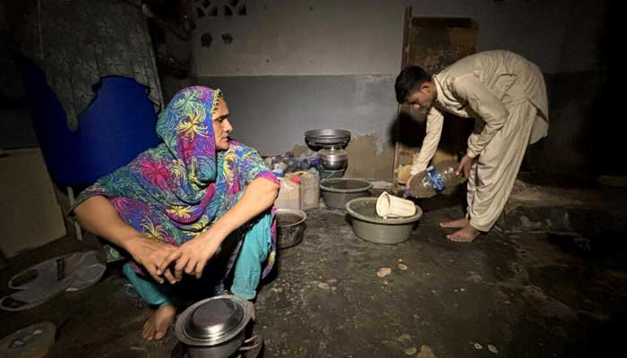 Maryam Suleman (L) and her son Ahmed Raza are both invisible in Pakistan, without identification papers. — AFP/File