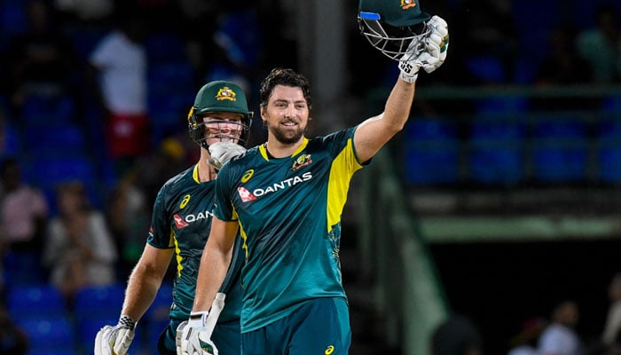 Tim David (Right) of Australia celebrates his century and teammate Mitchell Owen cheer him on during the third T20I match between West Indies and Australia at Warner Park Sporting Complex in Basseterre, Saint Kitts and Nevis, on July 25, 2025. — AFP