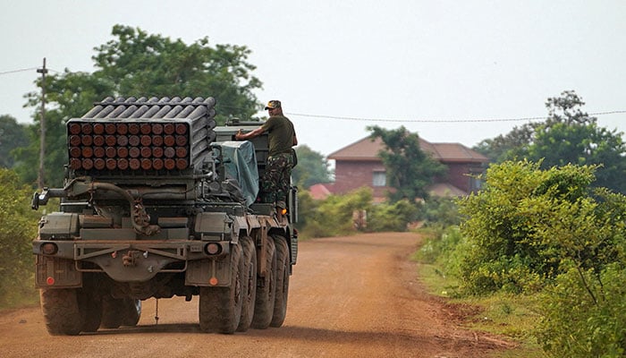A Cambodian military personnel stands on a BM-21 Grad multiple rocket launcher after Thailand and Cambodia exchanged heavy artillery in Oddar Meanchey province, Cambodia, July 25, 2025. — Reuters