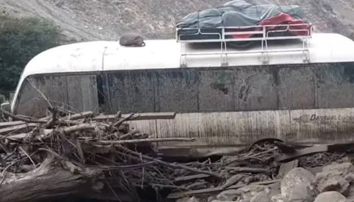 A vehicle caught in a landslide on Babusar Chilas road in this undated image. — Reporter