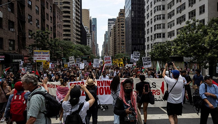 People march near the United Nations headquarters during a Stop Starving Gaza Now protest  in New York City, US on July 25, 2025. — Reuters