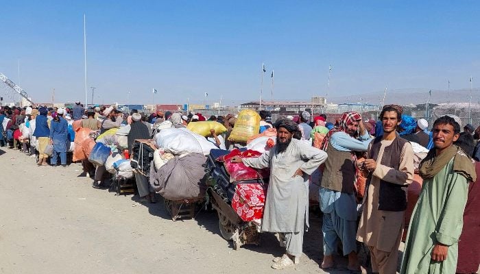 Afghan citizens wait with their belongings to cross into Afghanistan, at the Friendship Gate of Chaman Border Crossing along the Pakistan-Afghanistan Border in Balochistan, in Chaman, October 31, 2023. — Reuters