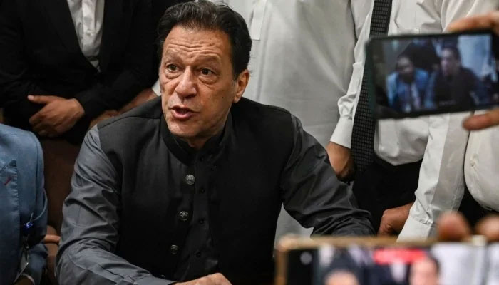 PTI founder Imran Khan speaks to the media in this undated image. — AFP/File