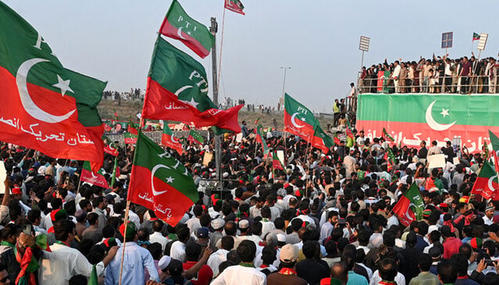 Activists of Pakistan Tehreek-e-Insaf (PTI) take part in a public rally on the outskirts of Lahore on September 21, 2024. — AFP/File