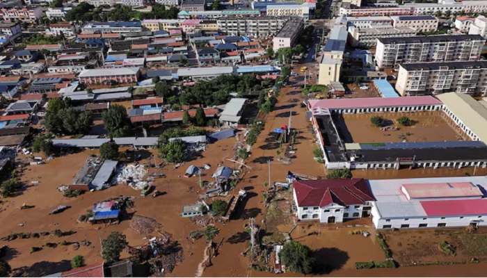 A drone view shows partially submerged village houses and other buildings after heavy rainfall flooded the area, in Miyun district of Beijing, China, July 29, 2025. —Reuters