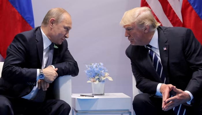 Russias President Vladimir Putin talks to US President Donald Trump during their bilateral meeting at the G20 summit in Hamburg, Germany. — Reuters/File