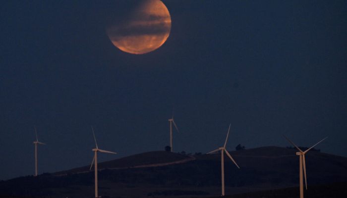 A lunar eclipse turns the Moon red near the Australian capital city of Canberra on March 14, 2025. — AFP