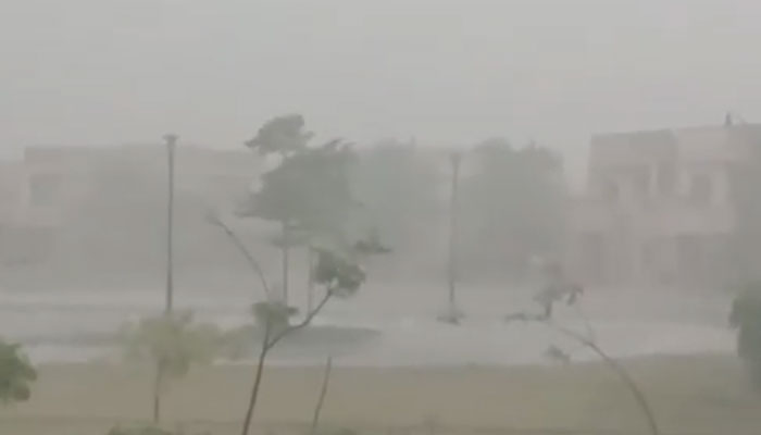 This photo shows heavy rain hitting a private housing society near the M9 Motorway in Karachi on September 7, 2025. — X/@FayzanAbro/screengrab