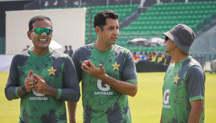Asif Afridi (centre) talks to Pakistan spin bowling coach Abdur Rehman during training session ahead of first Test against South Africa on October 9, 2025, in Lahore. — X PCB@TheRealPCB