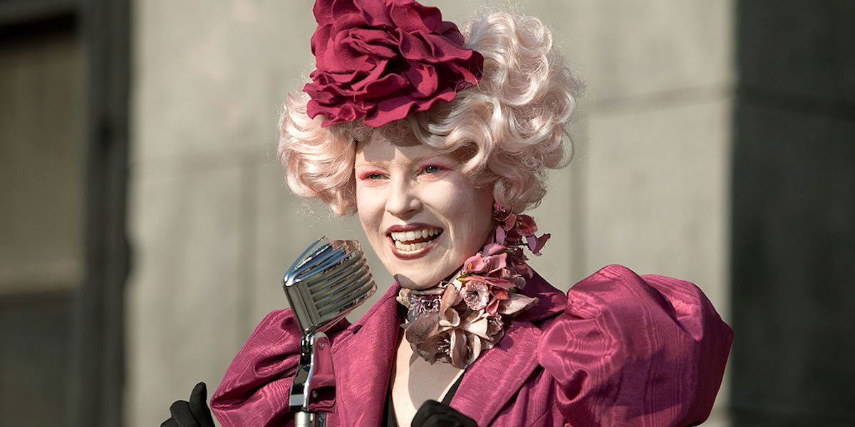 Elizabeth Banks plays Effie Trinket, an over-the-top stylist in The Hunger Games