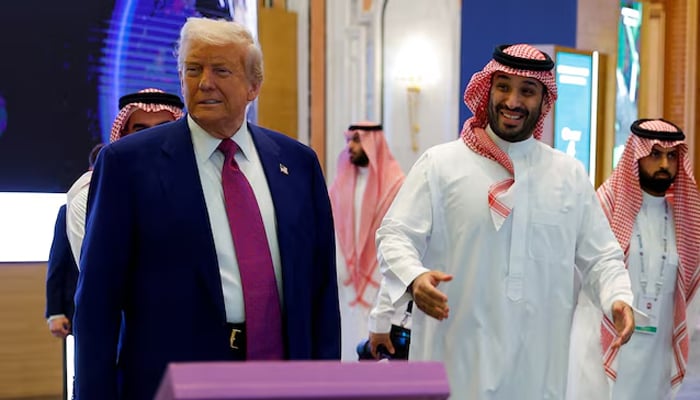Saudi Crown Prince Mohammed Bin Salman reacts next to U.S. President Donald Trump during the Saudi-US Investment Forum, in Riyadh, Saudi Arabia, May 13, 2025. — Reuters