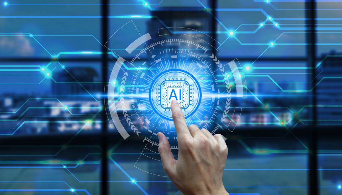 A representational image shows a person using AI on a screen. — Canva