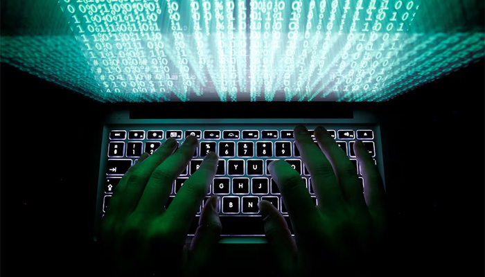 A man types on a computer keyboard in this illustration picture taken February 28, 2013. — Reuters