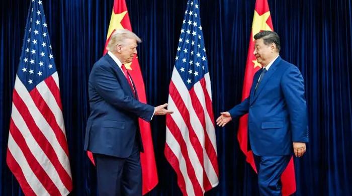 How is China sustaining US pressure?