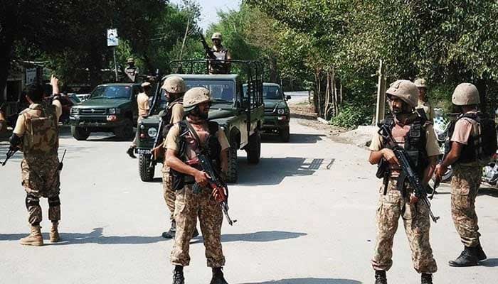 Pakistan Army soldiers cordon off a street leading to the outskirts of Peshawar. — AFP/File